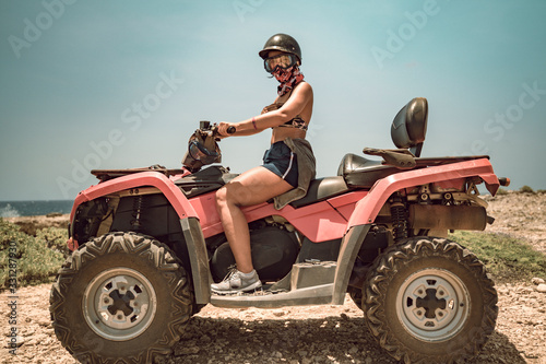 woman walking with ATV