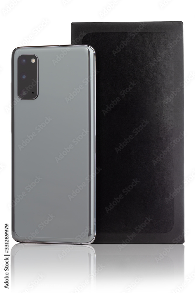 Smartphone on a white background. Smartphone and box from it isolated on a white background. Smartphone on a white background. Smartphone and box from it isolated on a white background.
