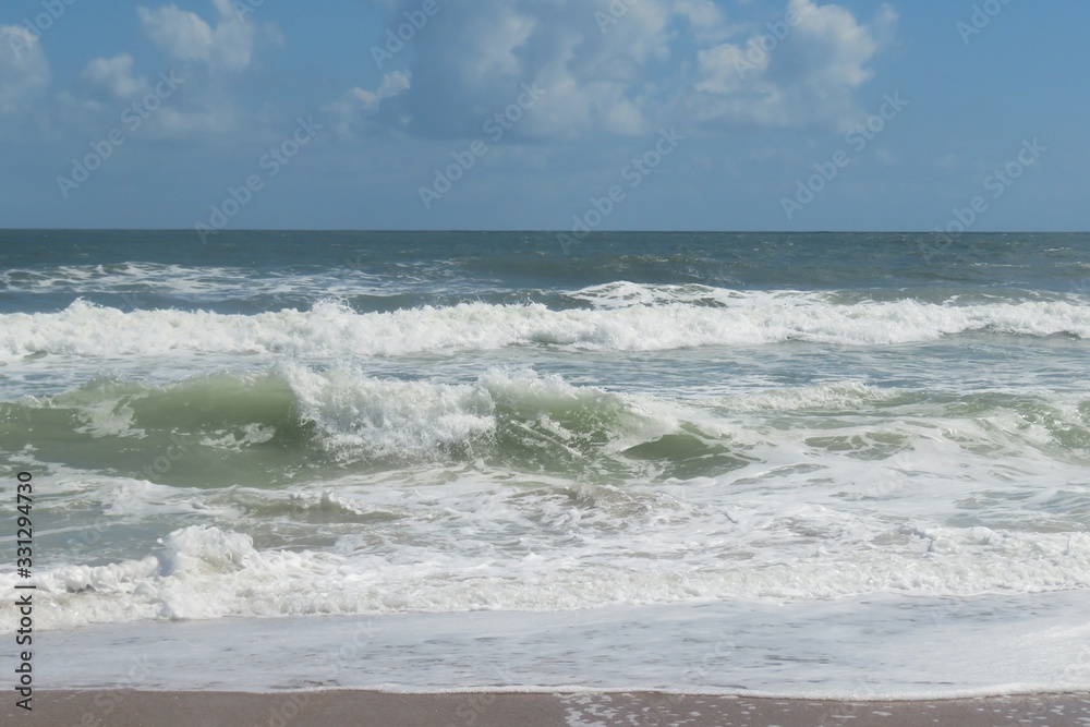 Beautiful ocean waves on the beach in Atlantic coast of North Florida Beautiful ocean waves on the beach in Atlantic coast of North Florida