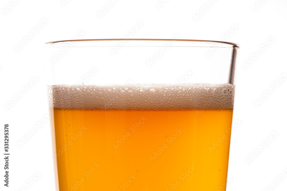 glass of beer with foam isolated on white glass of beer with foam isolated on white
