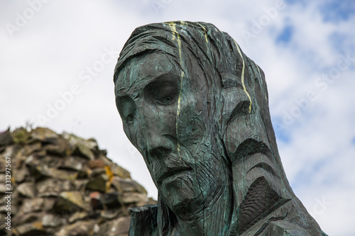 Obraz na płótnie Statue Of Saint Cuthbert on the Holy Island priory at Lindisfarne w salonie