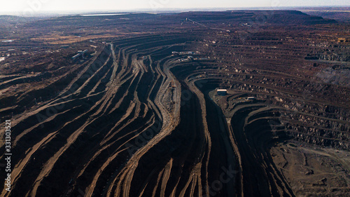 Aerial view of the Iron ore mining, Panorama of an open-cast mine extracting © Андрей Трубицын