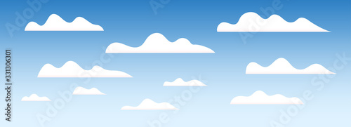 Naklejka Cloud set. Cartoon white clouds on blue sky. Stylized Design elements collection