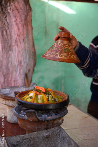 Making tagine in a roadside cafe in the Atlas Mountains Morocco