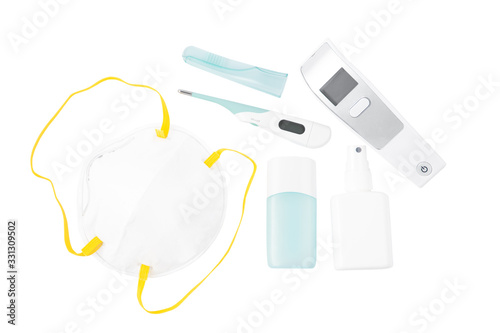 Mask for wearing germ protection Coronavirus or covid19 and gel alcohol or hand sanitizer bottle for washing hand, fever monitor for doctors and hospitals in isolated on white with Clipping Path.