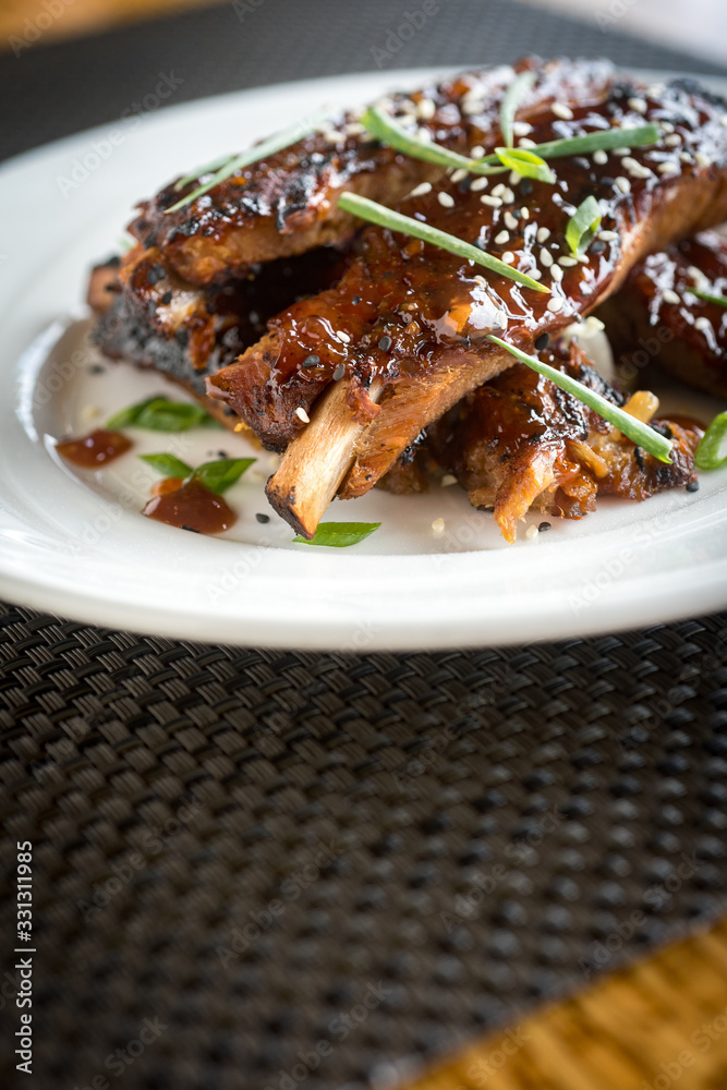 Baby back Pork Ribs with white sesame seeds and scallion Baby back Pork Ribs with white sesame seeds and scallion