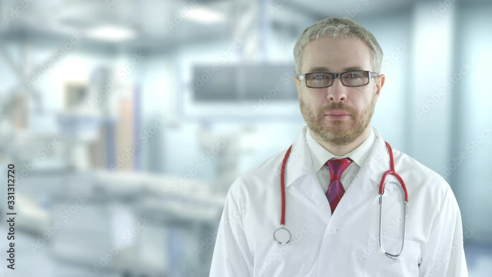 Portrait of a confident doctor in the modern operating room. Shot on Red camera Portrait of a confident doctor in the modern operating room. Shot on Red camera