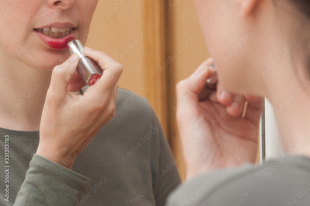 young real woman using skin cream young real woman using skin cream