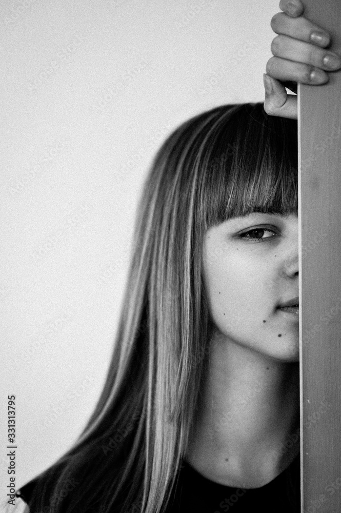 Φωτογραφία Close-up fragmentary  portrait of a beautiful thoughtful  teenage girl of the European race