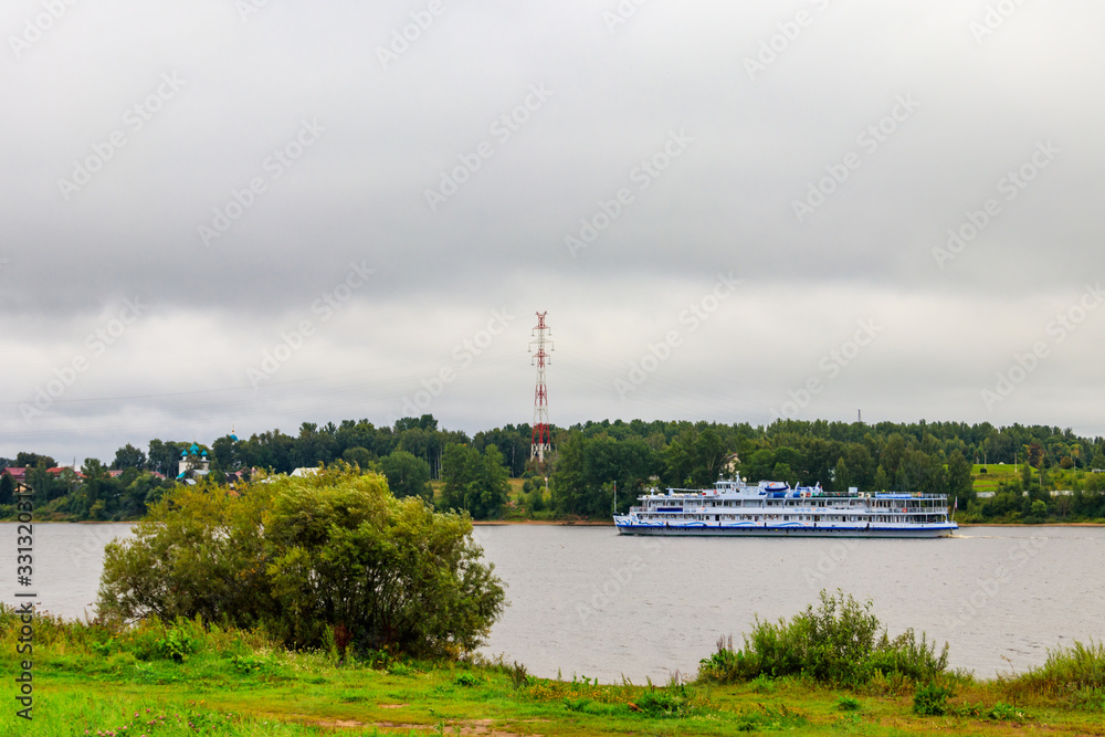 Passenger ship sailing on the Volga river in Yaroslavl, Russia Passenger ship sailing on the Volga river in Yaroslavl, Russia