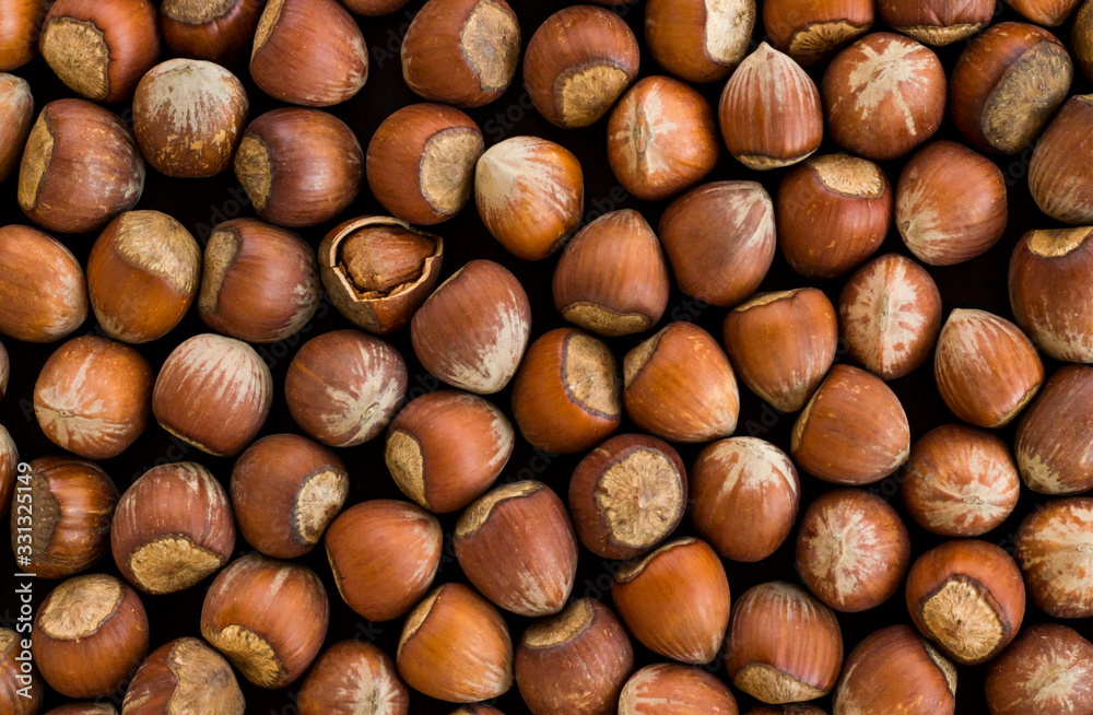 Close-up taken of Shelled Hazelnuts Background,flat layout Close-up taken of Shelled Hazelnuts Background,flat layout