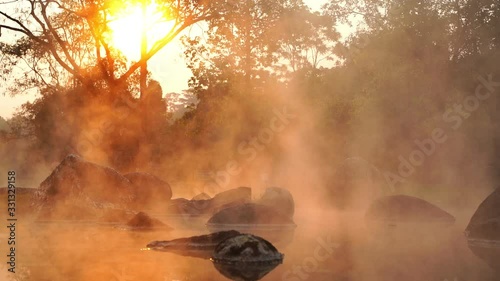 Hot Springs Onsen Natural Bath at National Park Chae Son, Lampang Thailand.In the morning sunrise.Natural hot spring bath surrounded by mountains in northern Thailand.