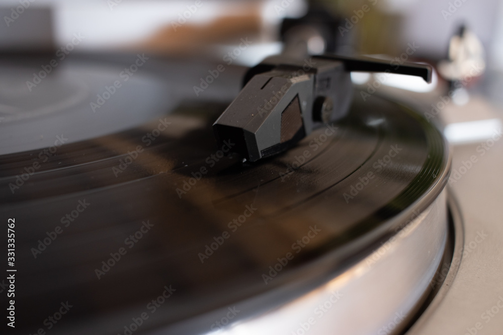 Close Up Of Turntable Needle On A Vinyl Record Turntable Playing Vinyl Needle On Rotating Black Vinyl Stock Photo Adobe Stock