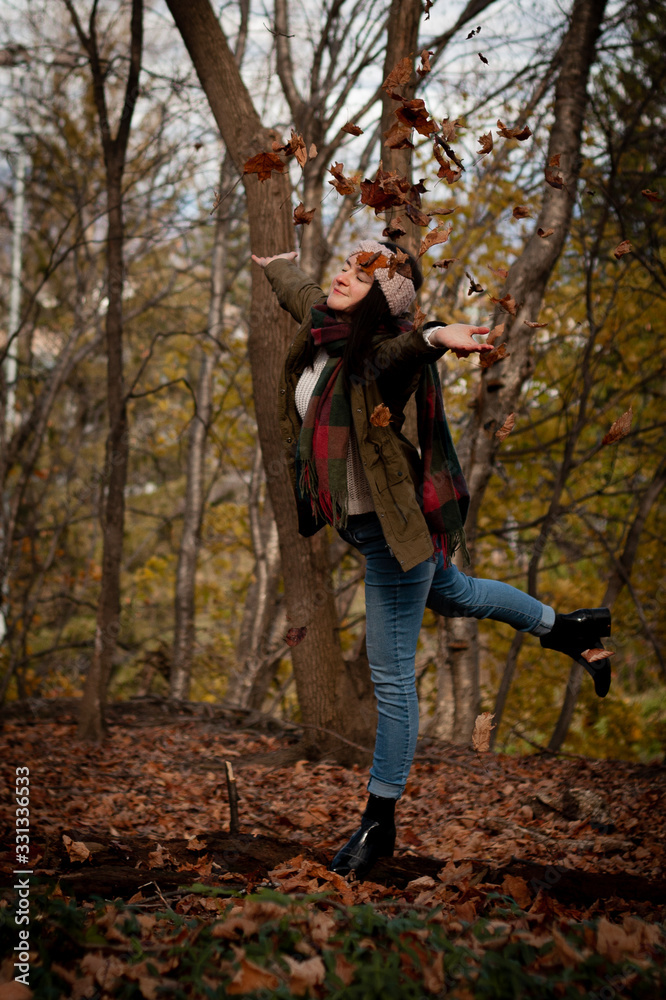 young woman jump in the autumn forest young woman jump in the autumn forest