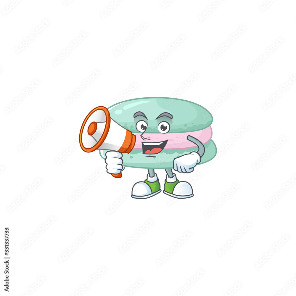 A picture of vanilla blue macarons with a megaphone A picture of vanilla blue macarons with a megaphone