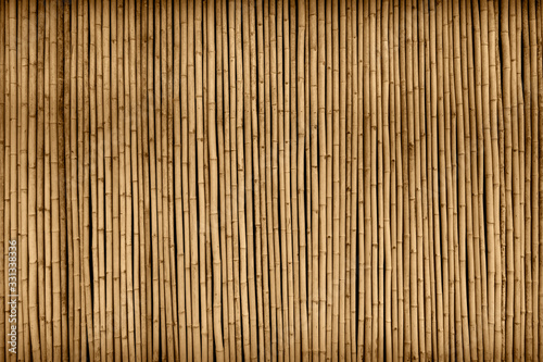 brown bamboo fence texture background © KPPWC