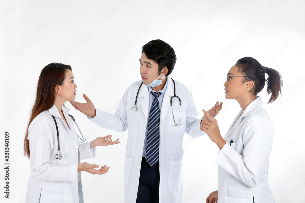 Asian Malay Chinese male female three doctors talking discussing serious on white background Asian Malay Chinese male female three doctors talking discussing serious on white background