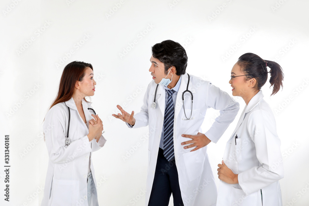 Asian Malay Chinese male female three doctors talking discussing serious on white background Asian Malay Chinese male female three doctors talking discussing serious on white background
