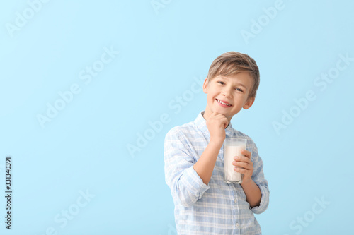 Little boy with milk on col...