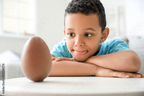 Cute African-American boy w...