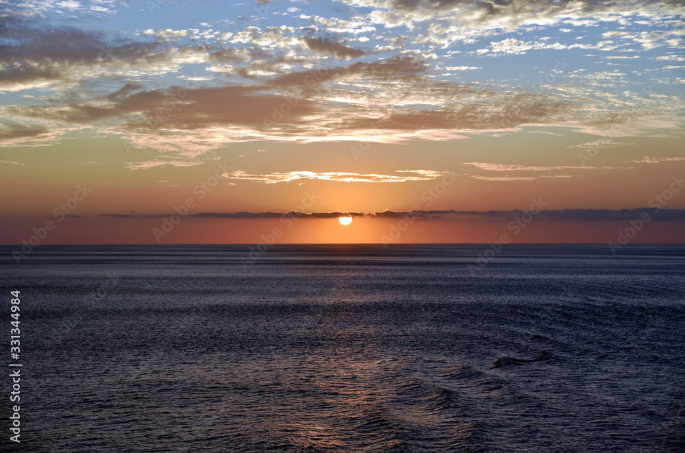 Beautiful sunset over the calm Pacific Ocean. Beautiful sunset over the calm Pacific Ocean.