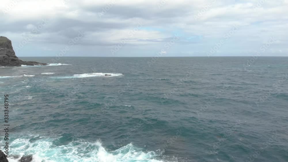 Forward moving aerial shot over wild oceans by the rocks and cliffs of Mornington Peninsula Victoria. Forward moving aerial shot over wild oceans by the rocks and cliffs of Mornington Peninsula Victoria.