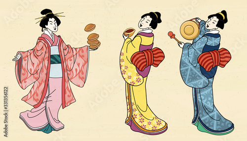 Girls holding dorayaki and gong