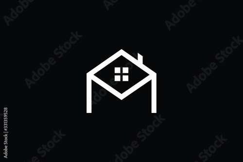 Logo design of M in vector for construction  home  real estate  building  property. Minimal awesome trendy professional logo design template on black background.