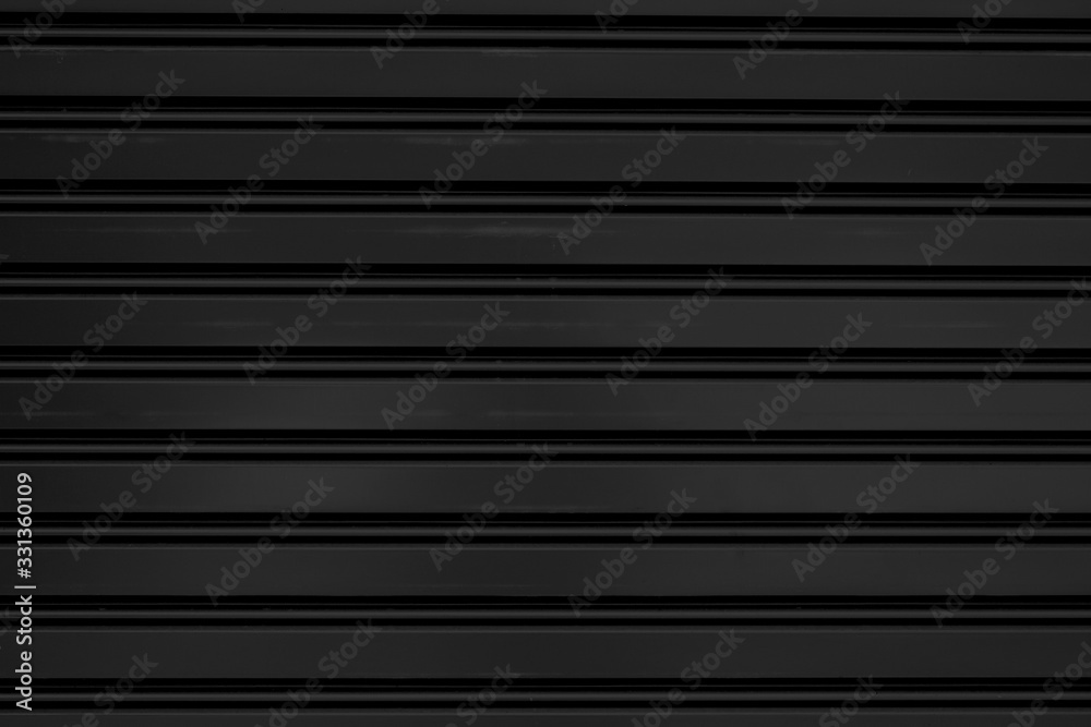 metal sheet black colour horizontal line texture. Graphic resource. Copy space for text. Pattern. Wall art metal sheet black colour horizontal line texture. Graphic resource. Copy space for text. Pattern. Wall art