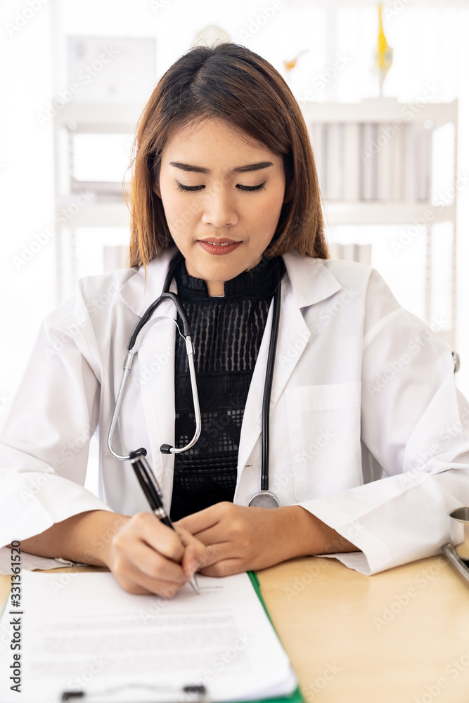 female doctor portrait sign document female doctor portrait sign document