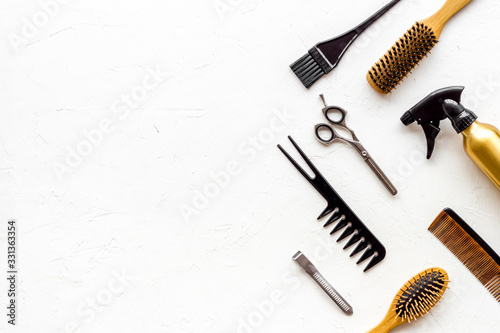 Beauty saloon concept. Hairdresser accessories pattern on white background top-down frame copy space