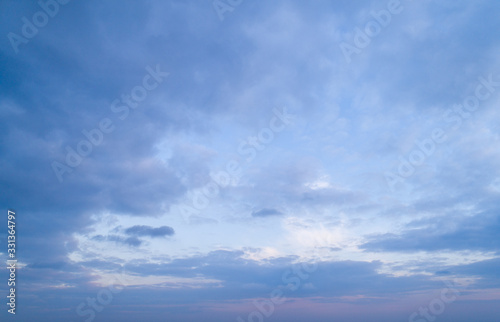 Fototapeta Naklejka Na Ścianę i Meble -  Beautiful sky with stretched clouds during twilight.