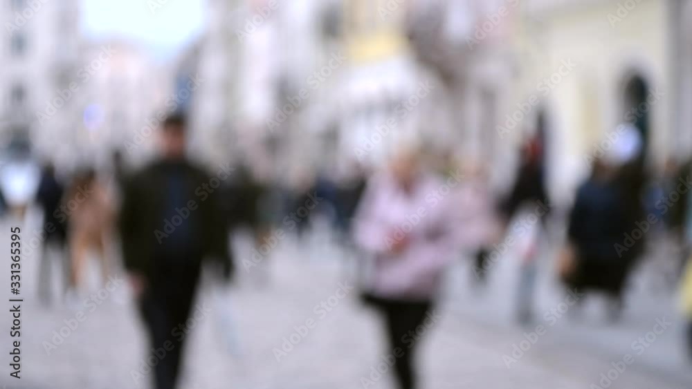 Abstract Defocused Blurred Background of many people on street Abstract Defocused Blurred Background of many people on street