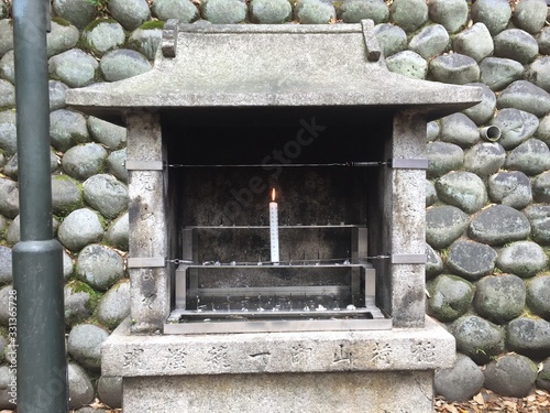 Single Candle in the Shrine