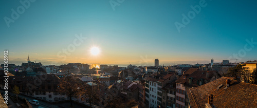 Panorama from Cathedral of Lausanne on the top of the hill in early evening hours. Panoramic evening view of Lausanne city from the Cathedral hill. © Anze