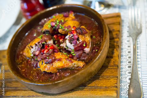 Cooked chicken in pomegranate sauce