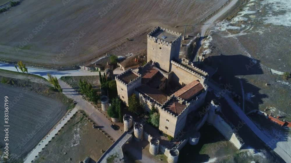 Aerial view of medieval spanish castle of Ampudia. Zoom out Aerial view of medieval spanish castle of Ampudia. Zoom out