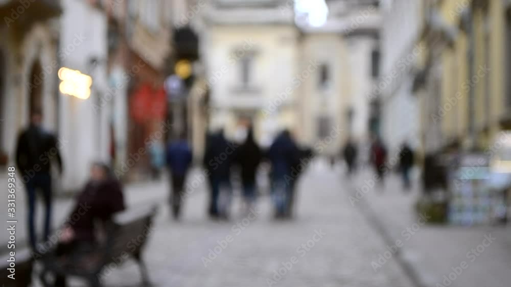 Abstract Defocused Blurred Background of many people on street Abstract Defocused Blurred Background of many people on street