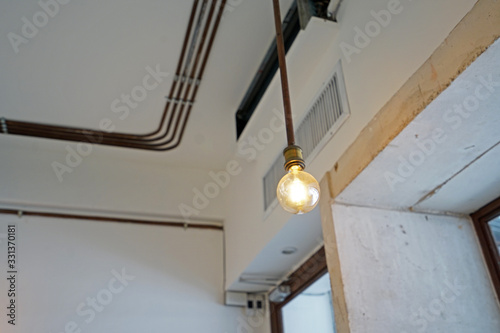 Close up hanging light bulb