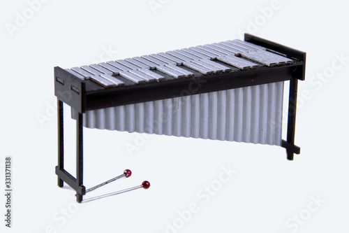 Fototapeta vibraphone and drumsticks isolated on white background