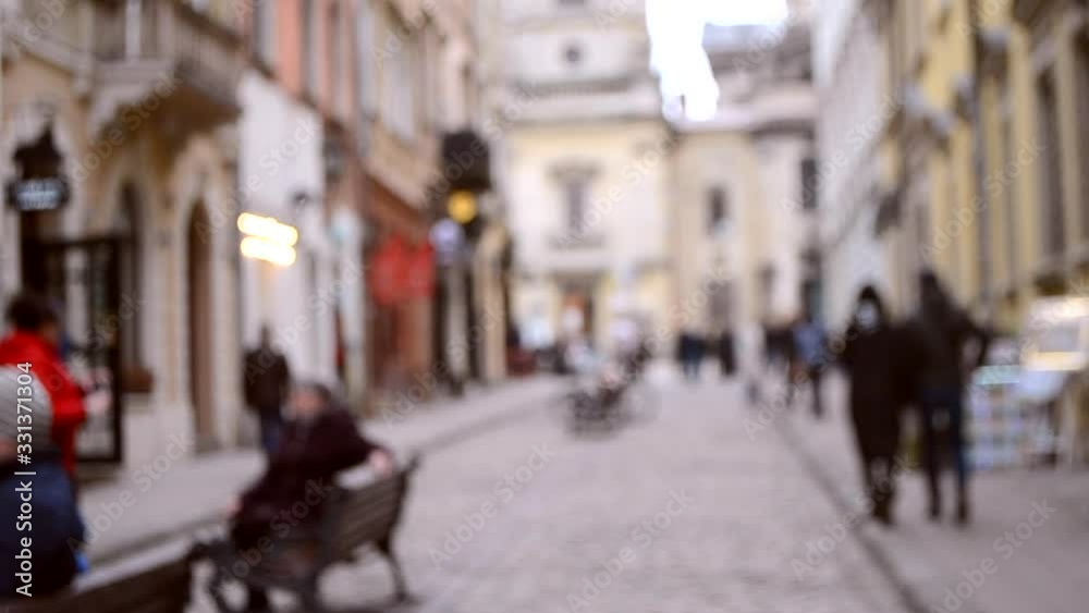 Abstract Defocused Blurred Background of many people on street Abstract Defocused Blurred Background of many people on street