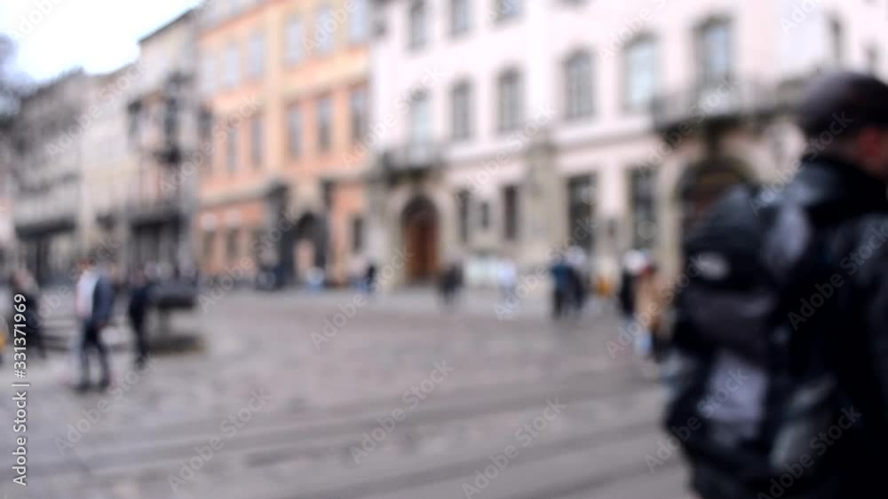 Abstract Defocused Blurred Background of many people on street Abstract Defocused Blurred Background of many people on street