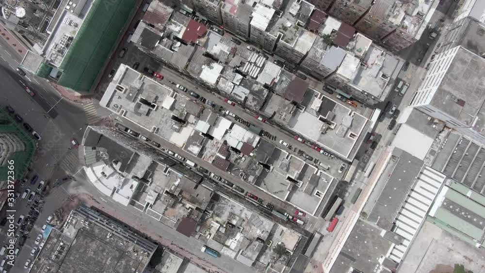 Hong Kong rundown slum houses, populated by work immigrant squatters, Top down aerial view. Hong Kong rundown slum houses, populated by work immigrant squatters, Top down aerial view.