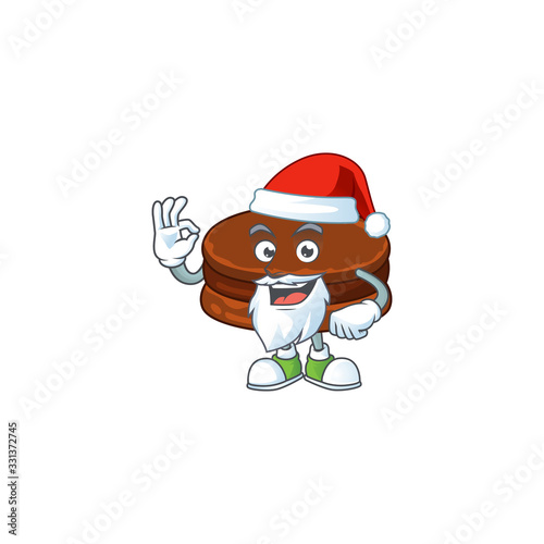 Chocolate alfajor cartoon character of Santa showing ok finger © kongvector