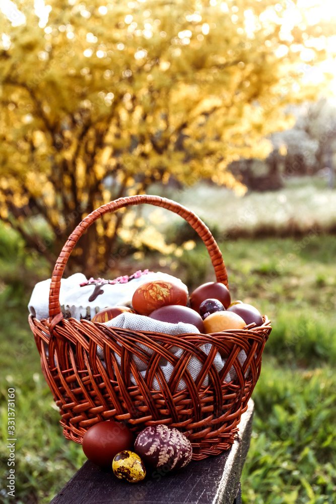 Easter background, multi-colored chicken and quail eggs on bright natural background.