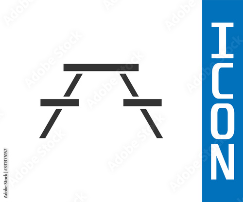 Grey Picnic table with benches on either side of the table icon isolated on white background. Vector Illustration