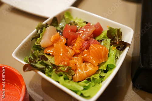 Close up Mixed sashimi salad- Salmon, Tuna and Hamachi fish