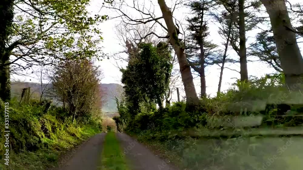 Dashcamera video with view on road with trees and benbulbin mountain Dashcamera video with view on road with trees and benbulbin mountain