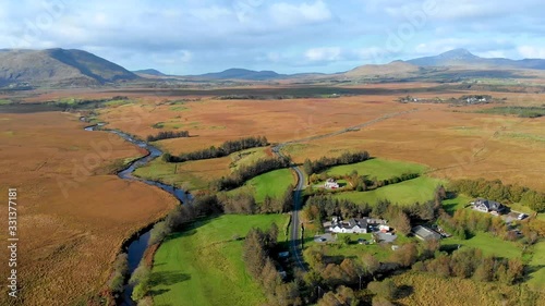 River and road in desert fields of Connemara National Park