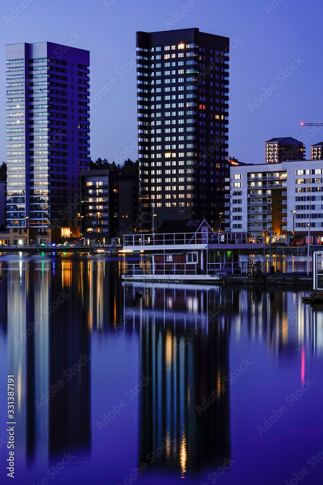 Naklejka premium Stockholm, Sweden March 19, 2020 The skyline of Liljeholmstorget at dawn.